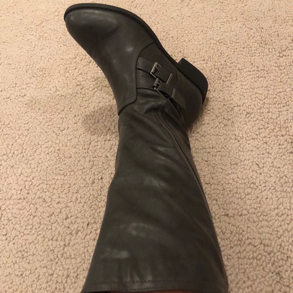Grey riding boots